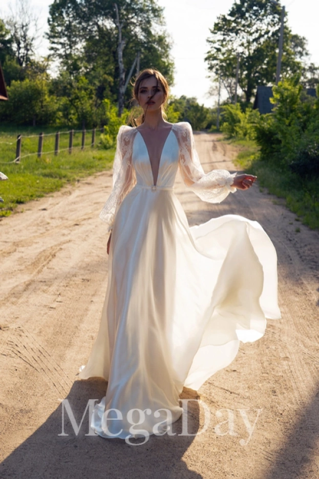 Свадебное платье Papilio 12077 с глубоким V-образным вырезом и развевающейся юбкой — вид спереди в полный рост.